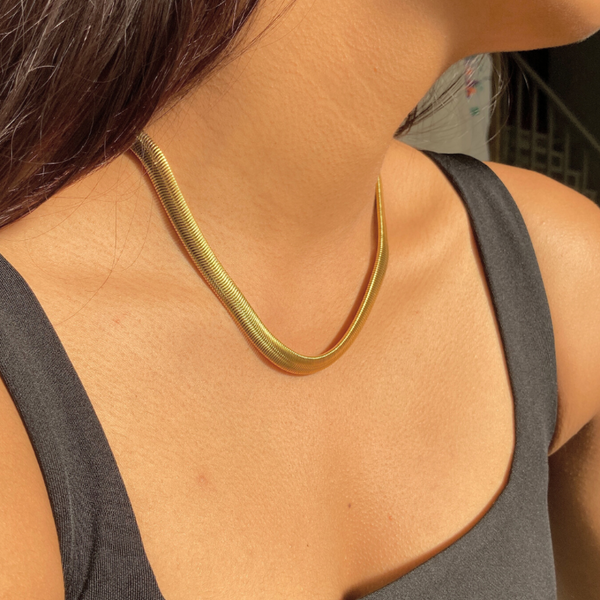 Gold statement chain. gold snake chain. Street Style Jewelry. Affordable Jewelry. Stainless Steel Jewelry. Sterling Silver Jewelry. Gold Plated Jewelry. Rose Gold Plated Jewelry. Cubic Zirconia Jewelry. High Quality Jewelry. Canadian Small Business. Dainty Jewelry. Tennis Chain. Men's Jewelry. Rope Chain. Herringbone Jewelry. Signet Ring. Baguette Ring. Women's Jewelry. 