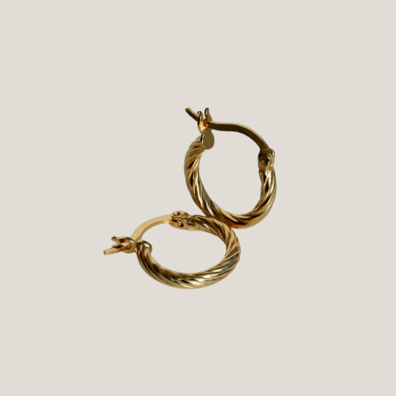 Gold dainty hoops. women's gold hugging hoops. gold braided hoops. toggle chain. Street Style Jewelry. Affordable Jewelry. Stainless Steel Jewelry. Sterling Silver Jewelry. Gold Plated Jewelry. Rose Gold Plated Jewelry. Cubic Zirconia Jewelry. High Quality Jewelry. Canadian Small Business. Dainty Jewelry. Tennis Chain. Men's Jewelry. Rope Chain. Herringbone Jewelry. Signet Ring. Baguette Ring. Women's Jewelry. 